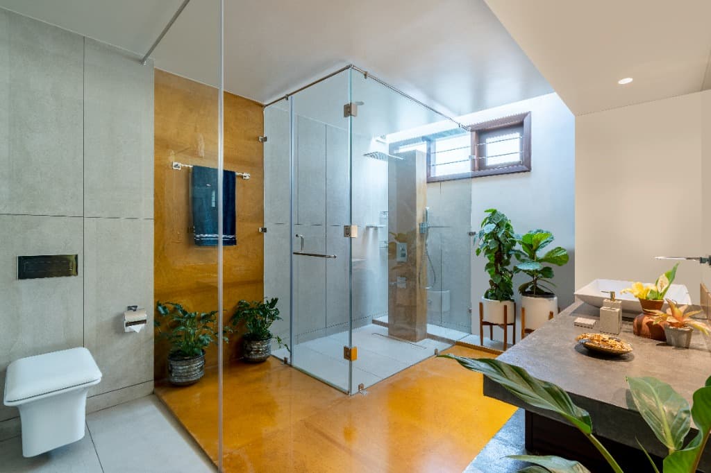 Master Ensuite with Ochre Stone & Glass Shower