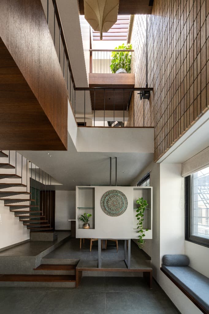 Double-Height Atrium & Teak Bridge Walkway