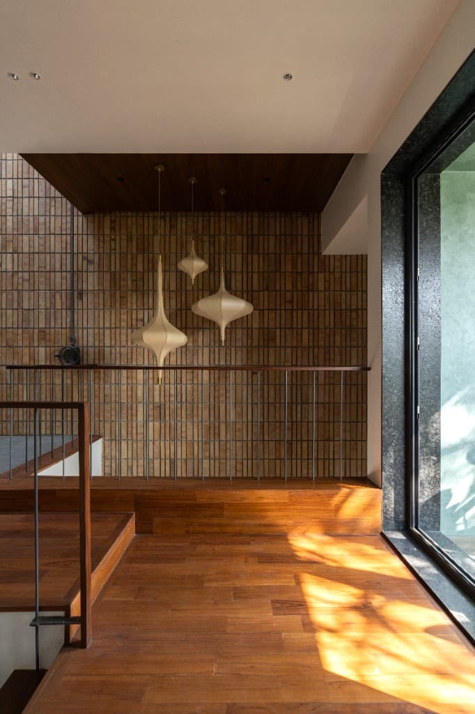 Teak Hallway & Fluted Brick Wall