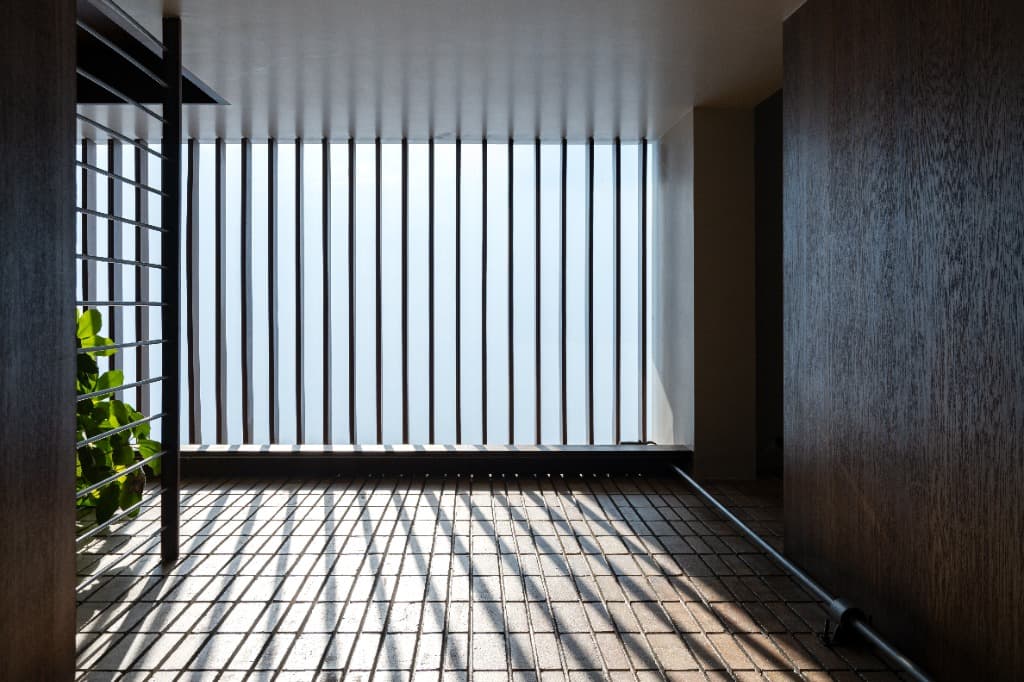 Rhythmic Louver Shadows on Upper Terrace