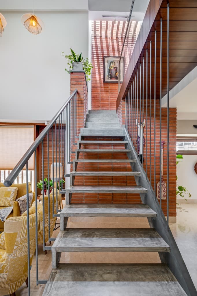 Cast Concrete Open Stair & Brick Lightwell