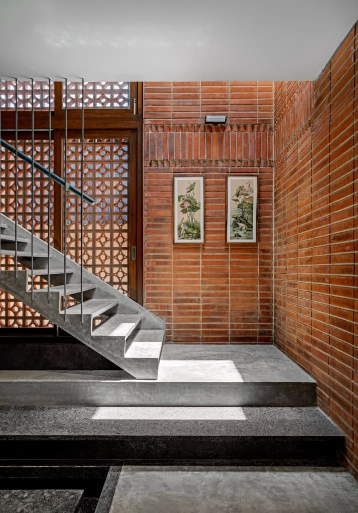 Concrete Open-Riser Staircase & Terracotta Jali