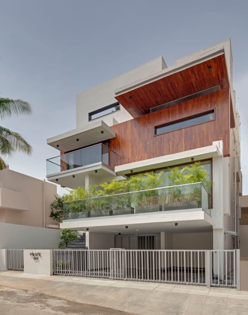 Cantilevered Teak Facade & Planter Balconies