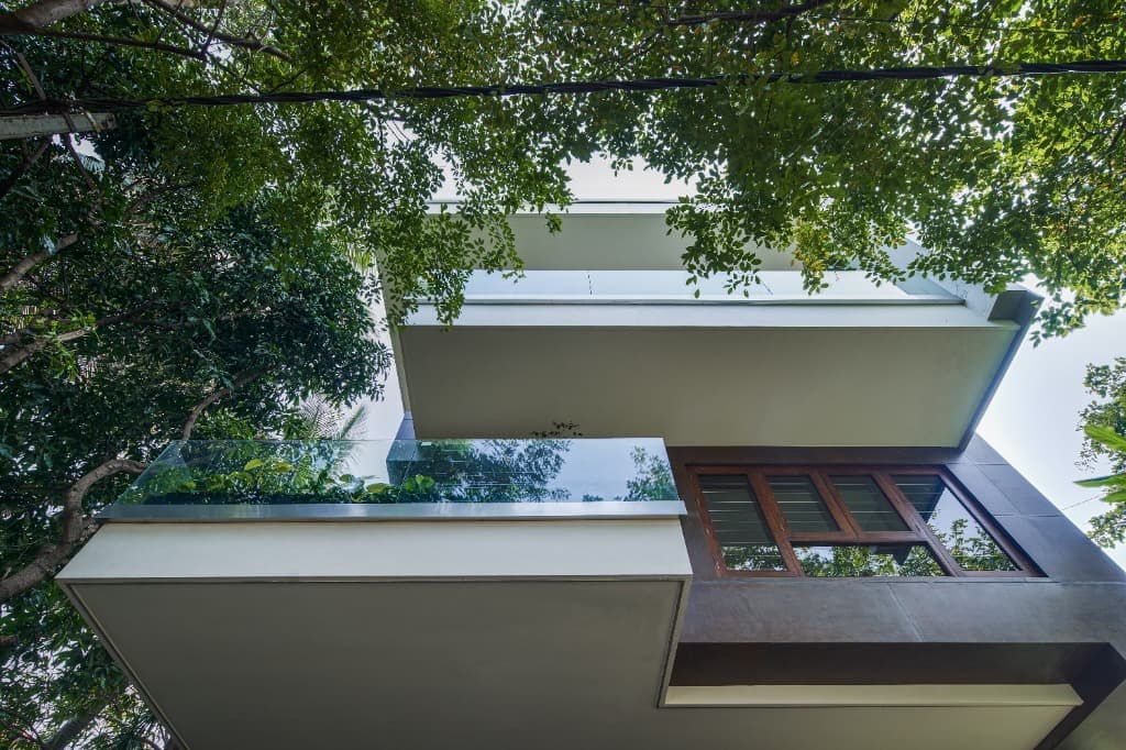 Cantilevered Balconies & Tropical Tree Canopy