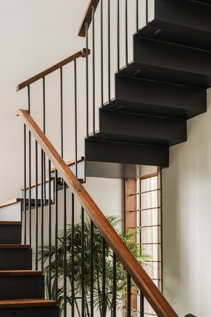 Folded Steel Staircase & Sculpted Teak Handrail
