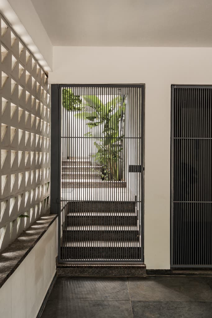 Slatted Security Gate & Sunlit Breeze-Block Jaali