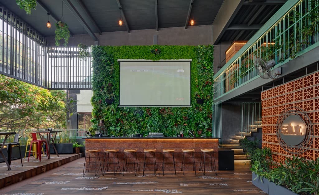 Linear Brick Bar & Double-Height Living Wall